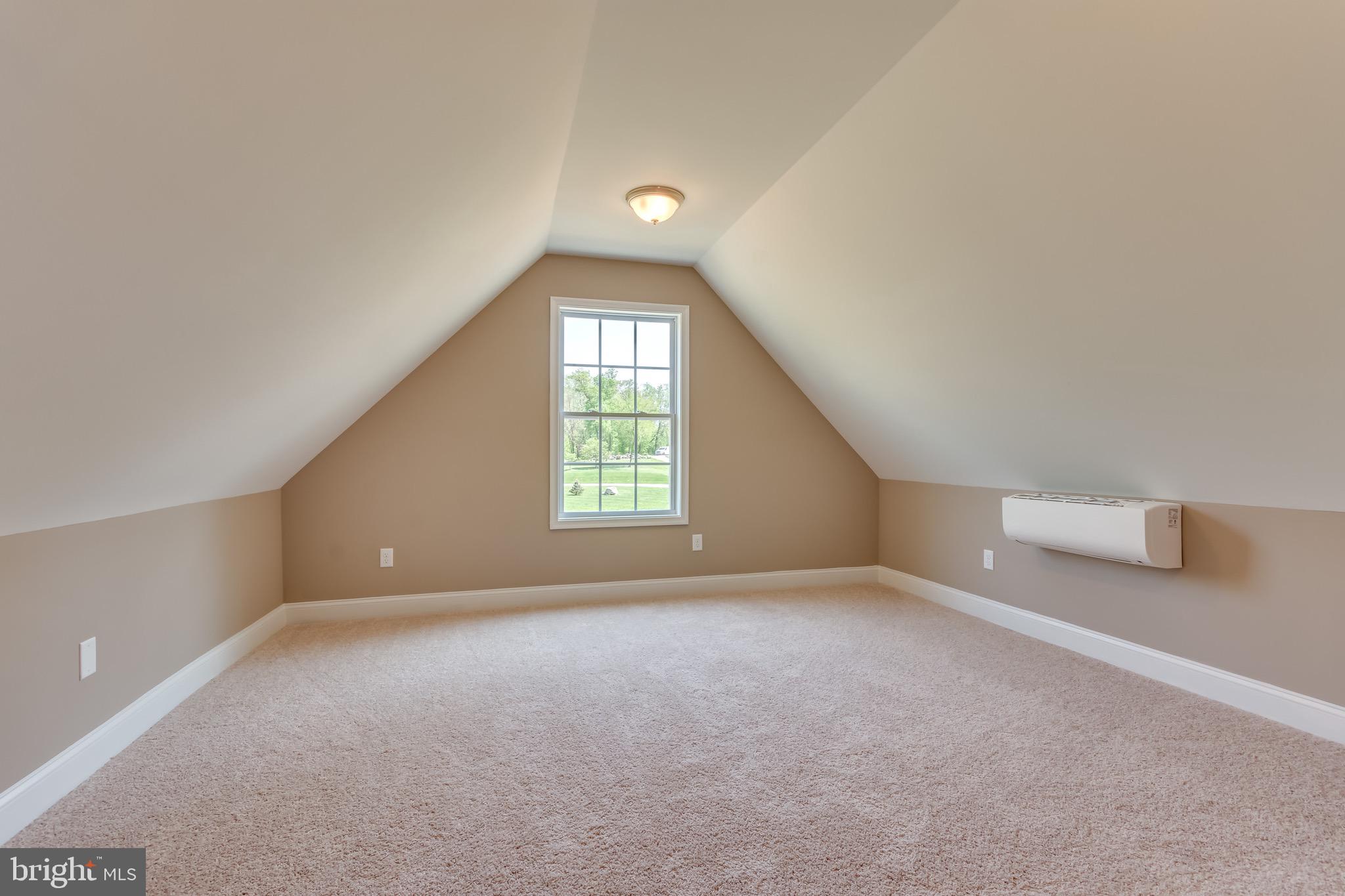 25 Fulton Road Hedgesville, WV 25427 - Photo 30 of 35 an empty room with windows and entrance