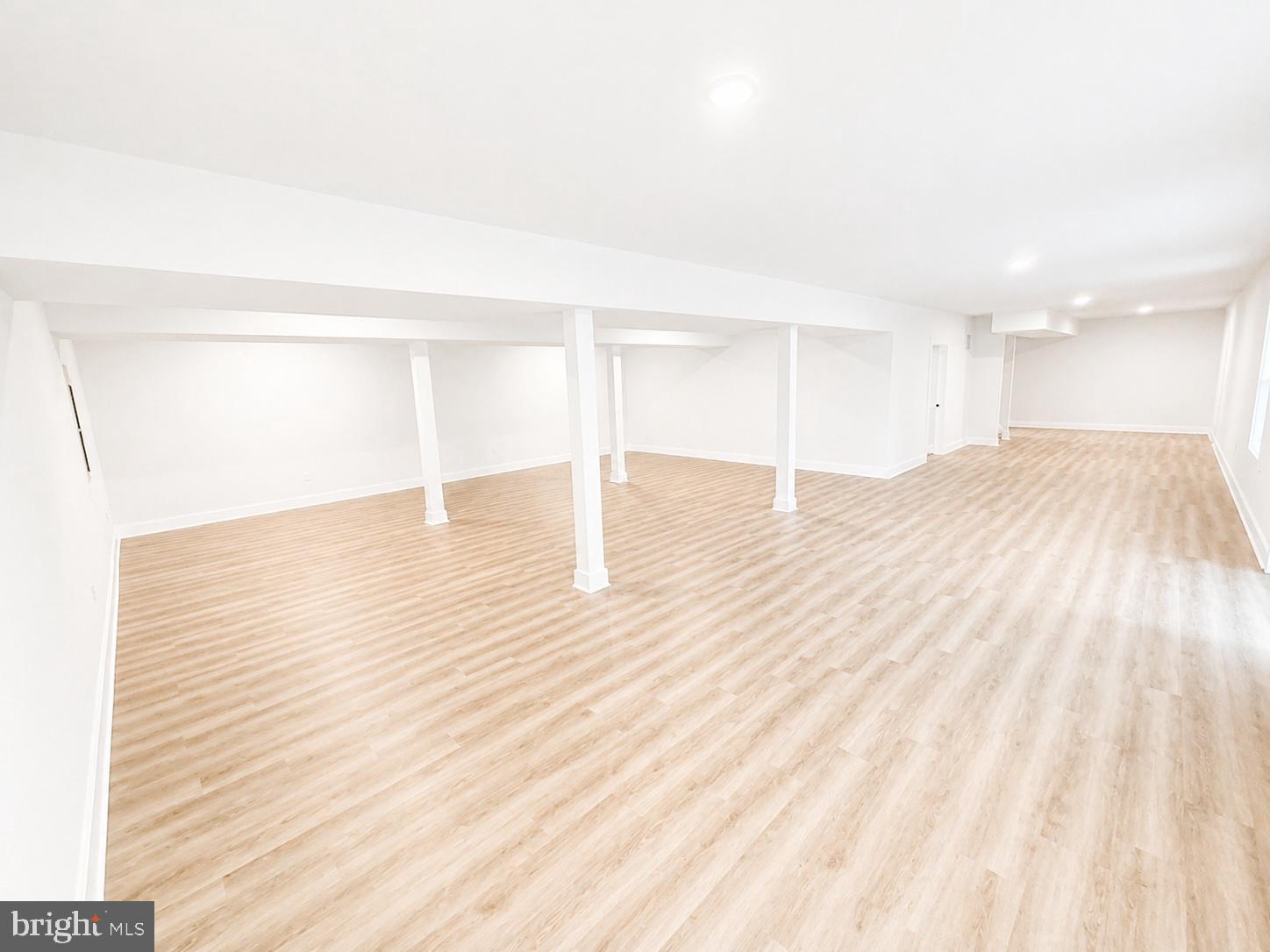 1321 Fulton Road Hedgesville, WV 25427 - Photo 32 of 36 a view of an empty room and wooden floor