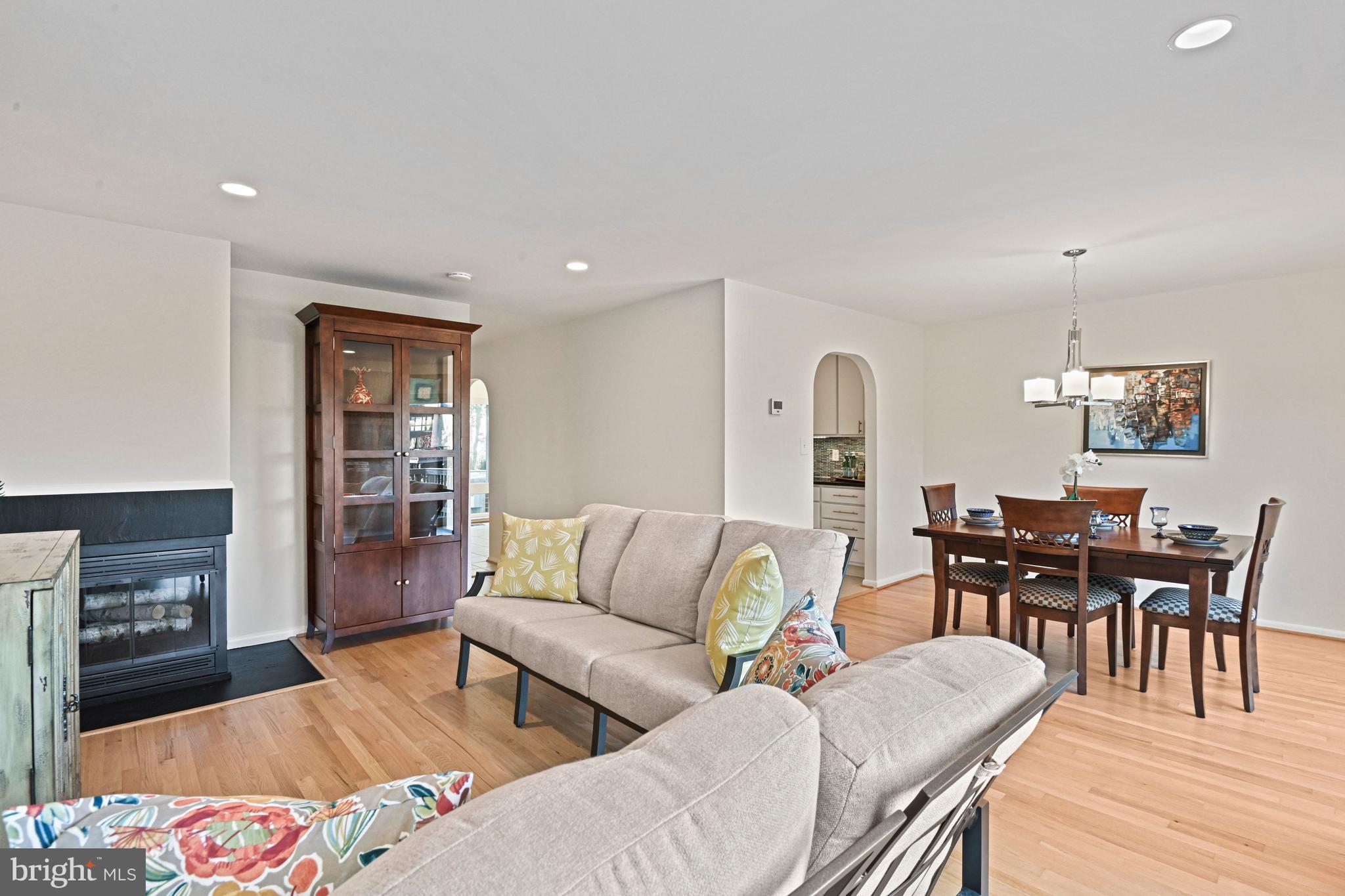 2029 Chadds Ford Drive Reston, VA 20191 - Photo 21 of 55 a living room with furniture fireplace and wooden floor