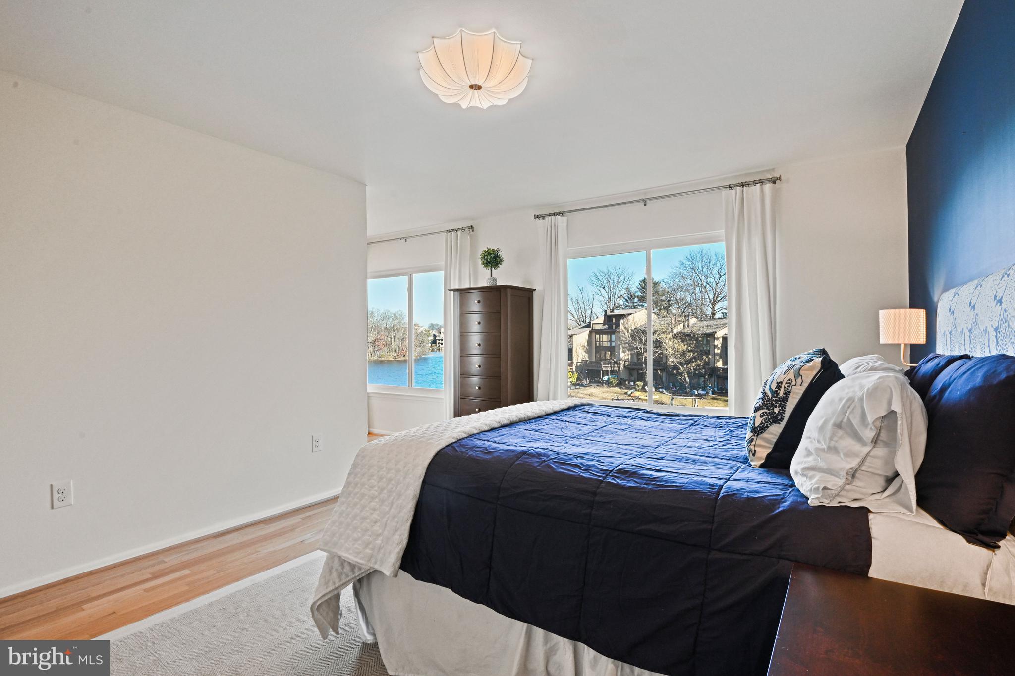 2029 Chadds Ford Drive Reston, VA 20191 - Photo 24 of 55 a bedroom with a bed and a window