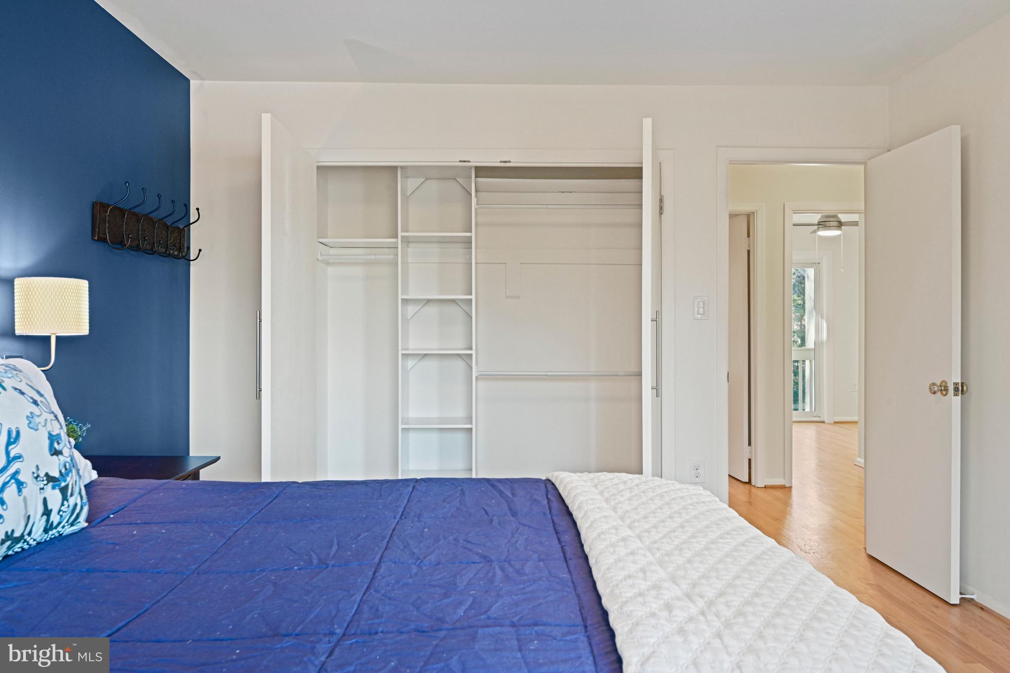 2029 Chadds Ford Drive Reston, VA 20191 - Photo 26 of 55 a bedroom with a bed and cabinet