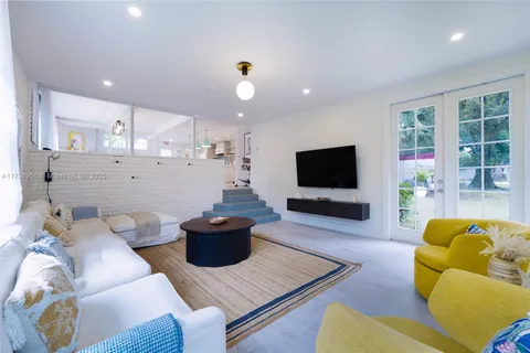 a bedroom with bed and window