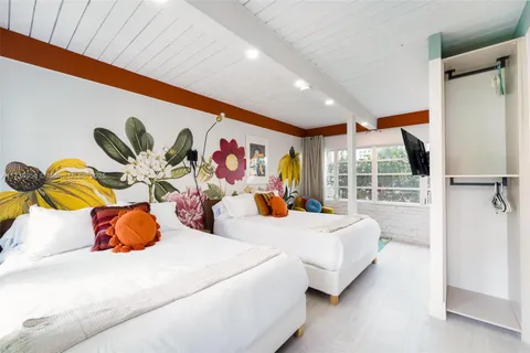 a bathroom with a sink a mirror and a toilet