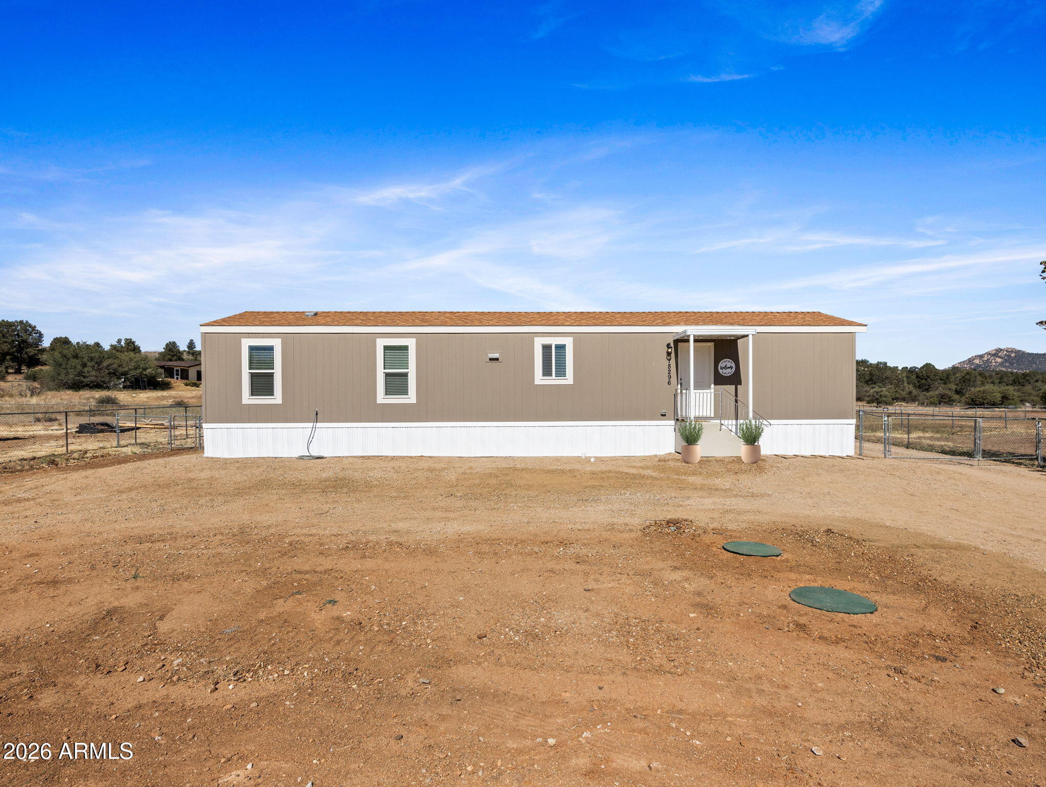 18296 Frontier Road Peeples Valley, AZ 86332 - Photo 6 of 44 a view of house with yard and front view of house