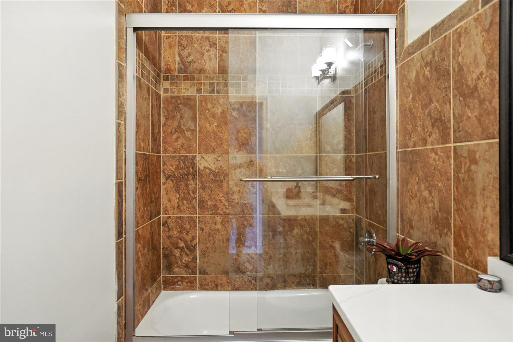 416 Mosher Street Baltimore, MD 21217 - Photo 24 of 38 a bathroom with a shower