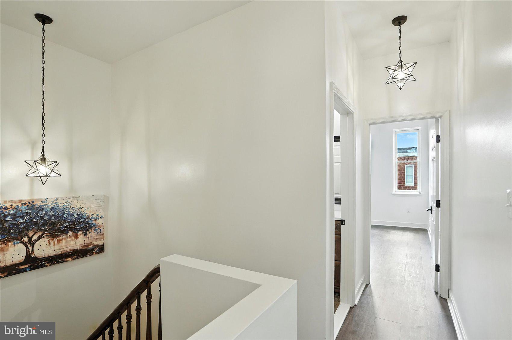 416 Mosher Street Baltimore, MD 21217 - Photo 28 of 38 a view of a chandelier and entryway