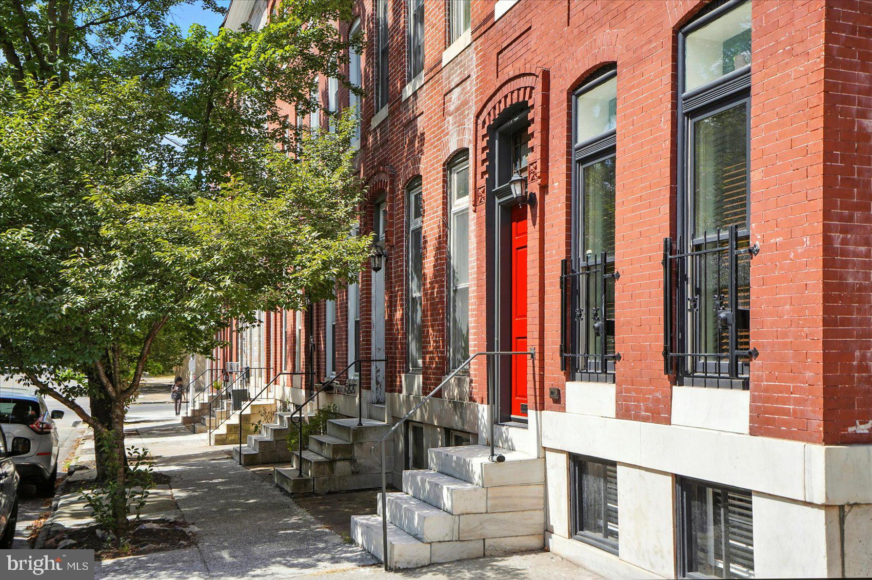416 Mosher Street Baltimore, MD 21217 - Photo 3 of 38 a view of multiple house with large windows
