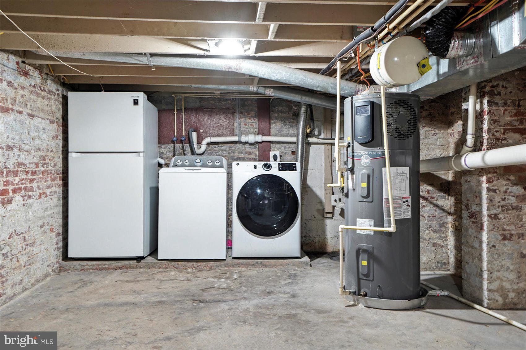 416 Mosher Street Baltimore, MD 21217 - Photo 36 of 38 a utility room with dryer and washer