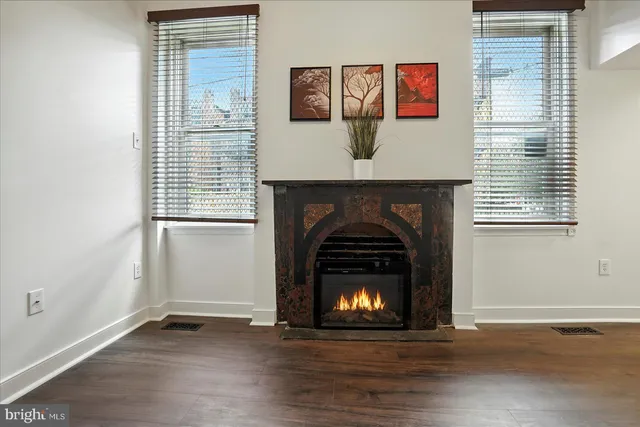 a living room with a fireplace