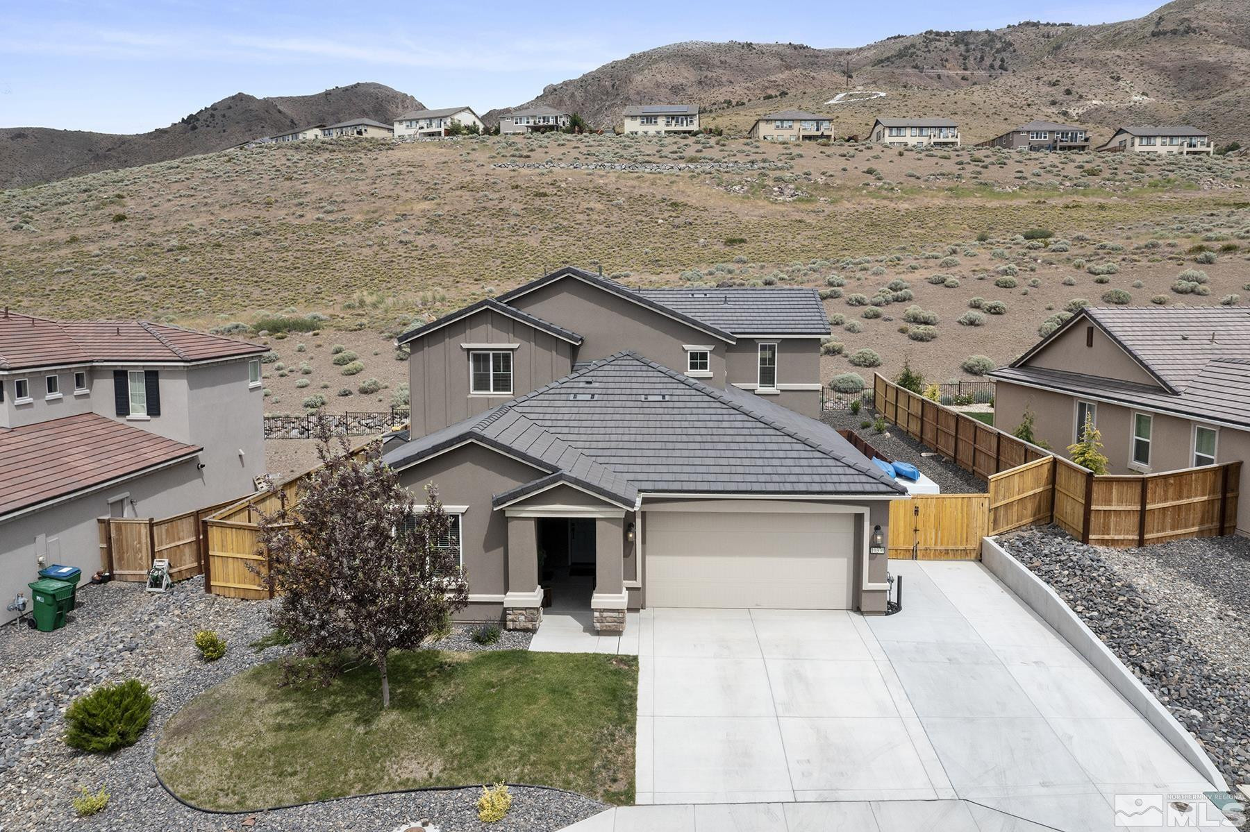 10370 Gold Mine Drive Reno, NV 89521 - Photo 31 of 31 front view of house with a yard