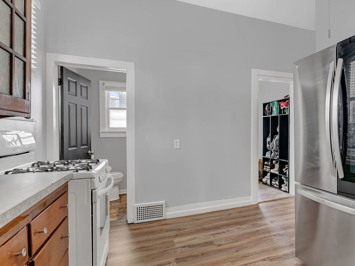145 West Maple Street Coal City, IL 60416 - Photo 12 of 31 an empty room with wooden floor and closet