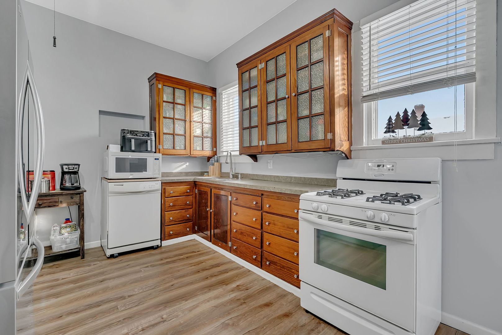 145 West Maple Street Coal City, IL 60416 - Photo 14 of 31 a kitchen with stainless steel appliances granite countertop a stove and a sink