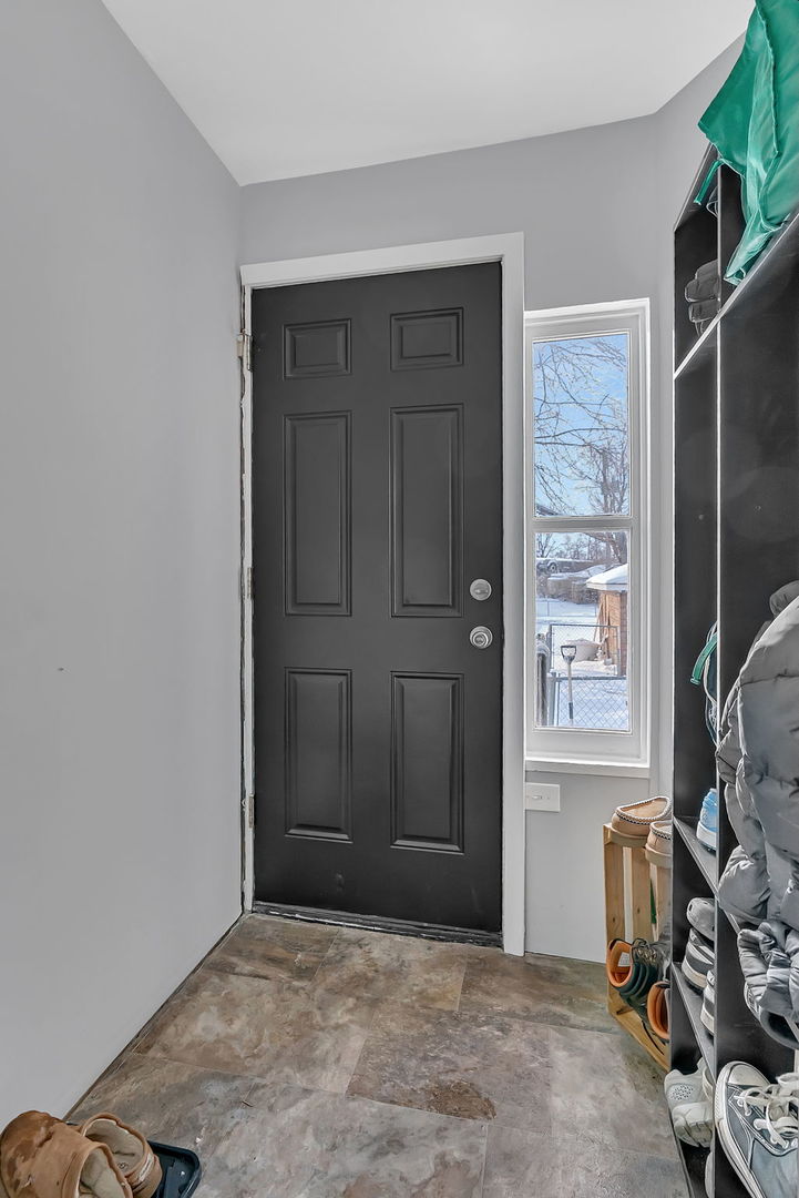 145 West Maple Street Coal City, IL 60416 - Photo 17 of 31 a view of an empty room with a window