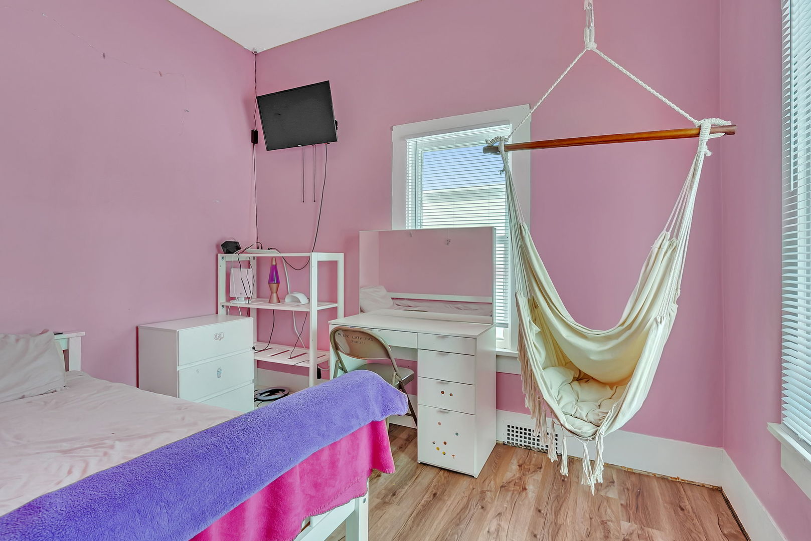 145 West Maple Street Coal City, IL 60416 - Photo 21 of 31 a bedroom with furniture and a wooden floor