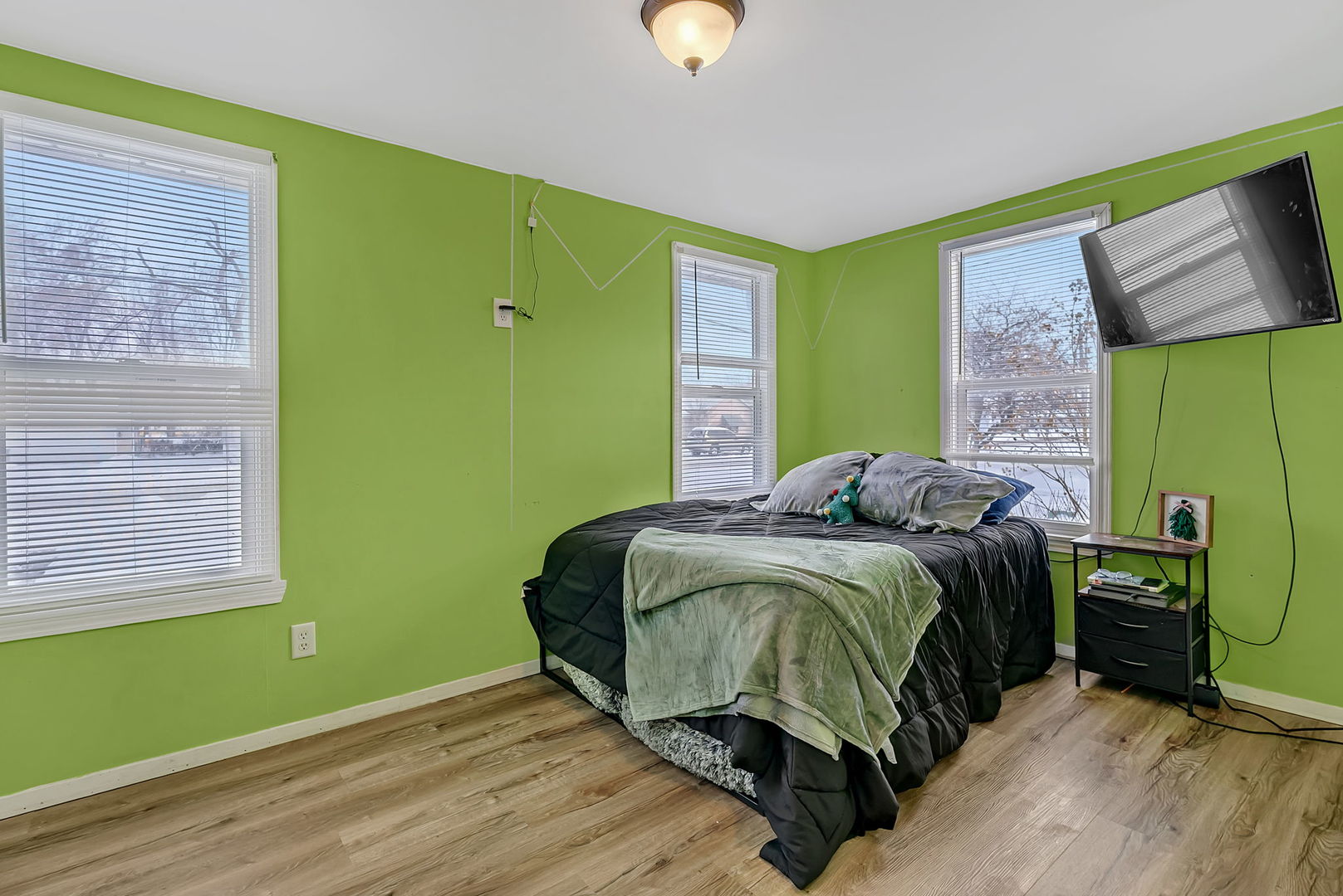 145 West Maple Street Coal City, IL 60416 - Photo 22 of 31 a bedroom with a bed and windows