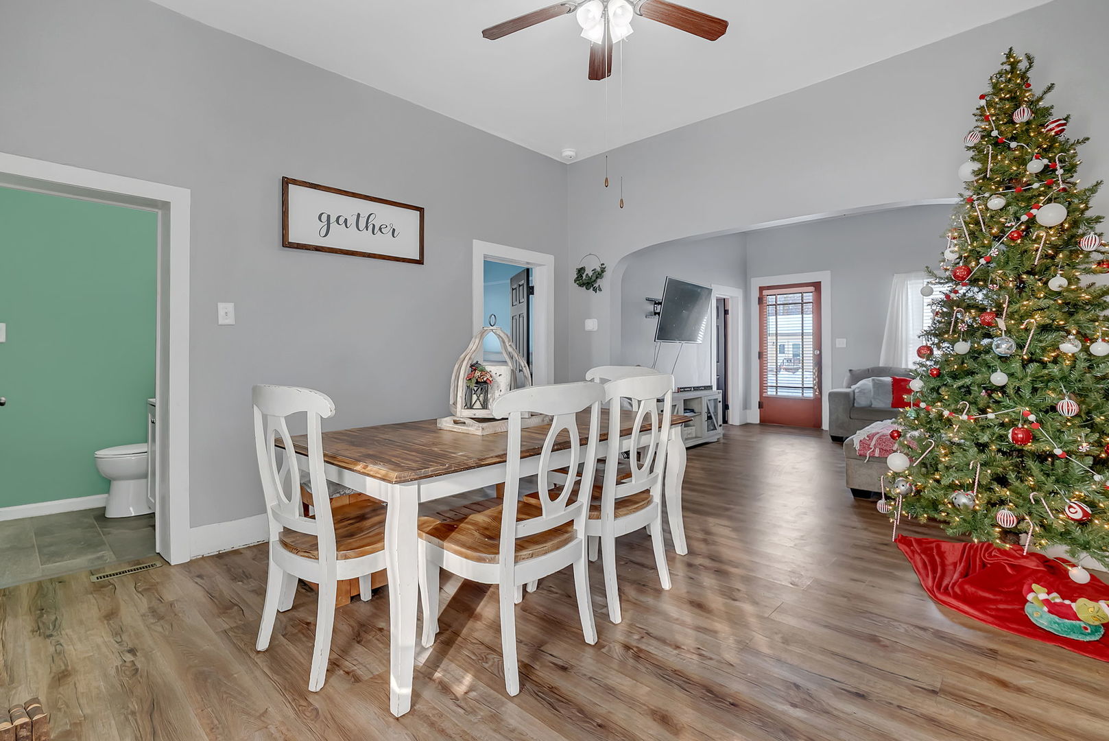 145 West Maple Street Coal City, IL 60416 - Photo 9 of 31 a view of a dining room with furniture wooden floor and chandelier