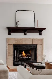 a living room with a fireplace