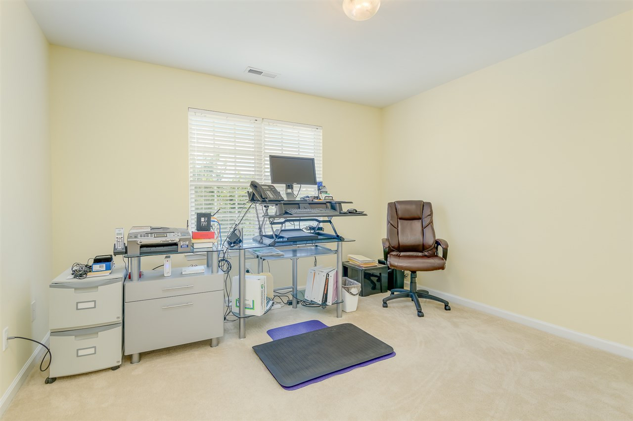 3525 Oneonta Avenue Raleigh, NC 27604 - Photo 17 of 22 a living room with furniture and a flat screen tv