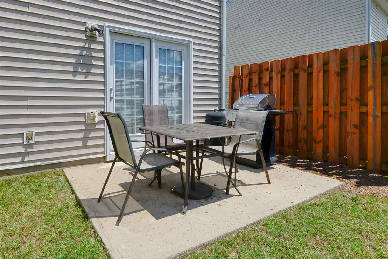3525 Oneonta Avenue Raleigh, NC 27604 - Photo 21 of 22 a view of a chairs and table in patio