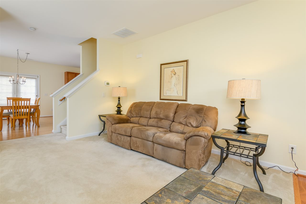 3525 Oneonta Avenue Raleigh, NC 27604 - Photo 4 of 22 a living room with furniture and a wooden floor