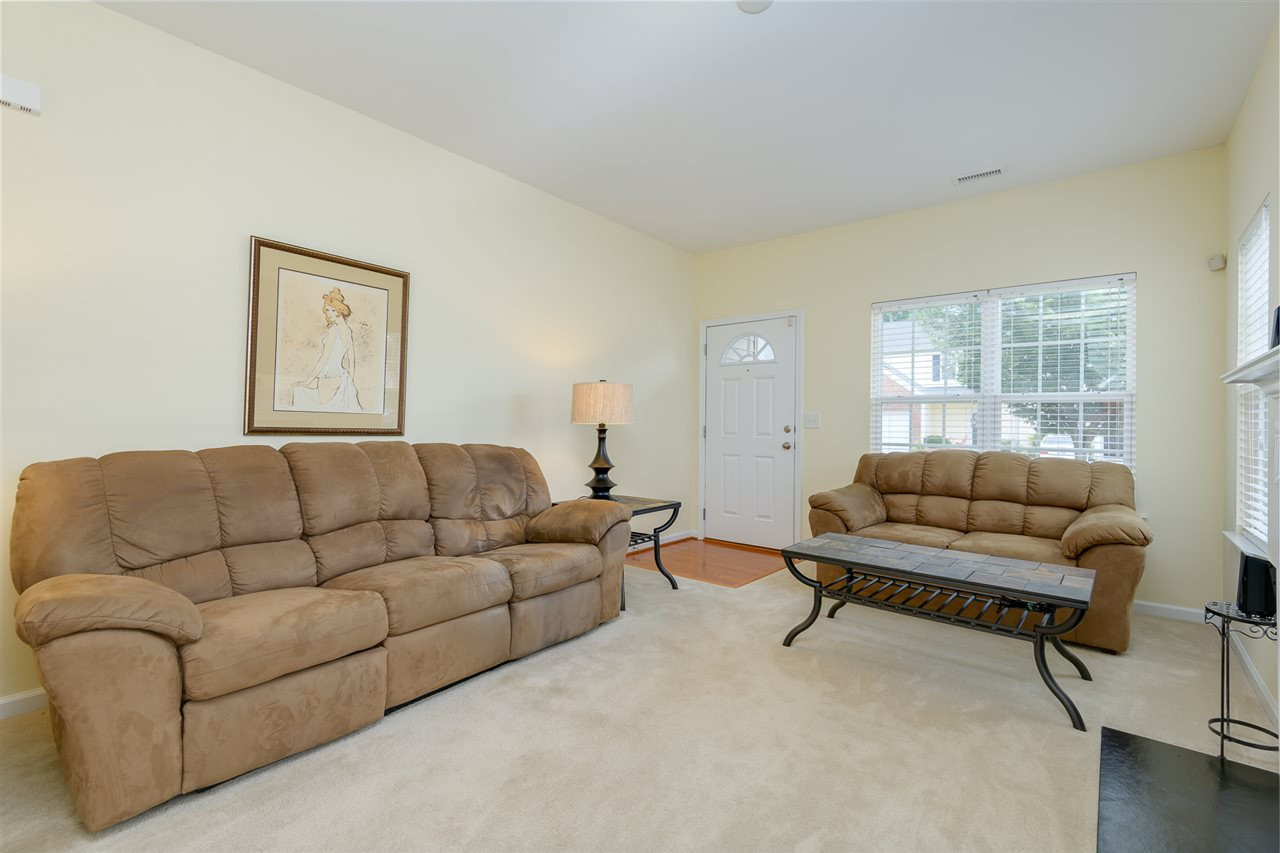 3525 Oneonta Avenue Raleigh, NC 27604 - Photo 6 of 22 a living room with furniture and a window