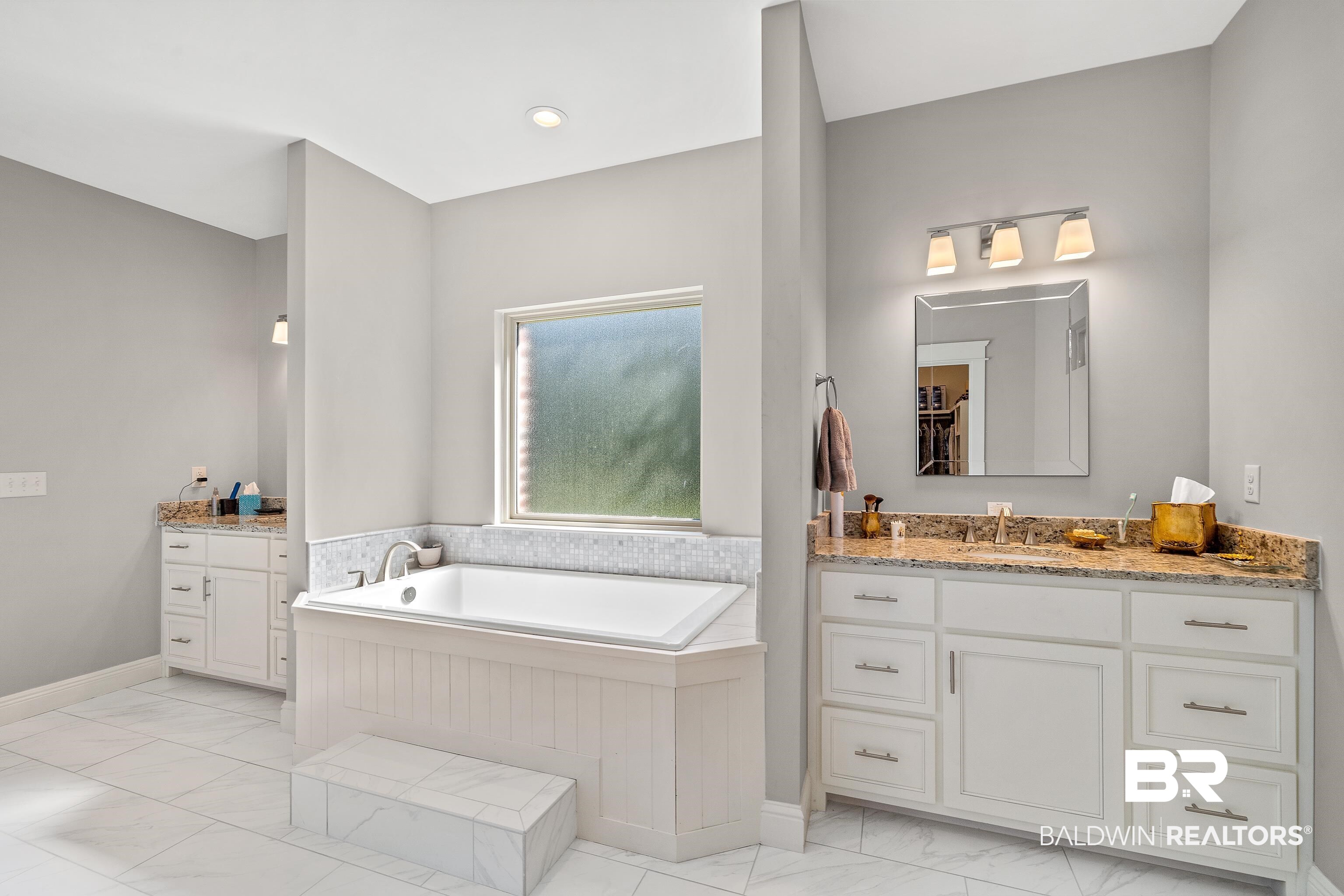 29530 St John Street Daphne, AL 36526 - Photo 18 of 38 Bathroom with a bath and vanity