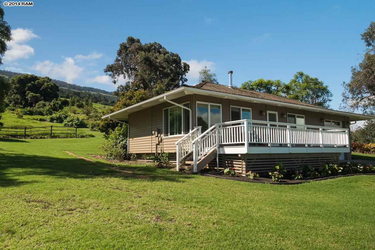 8037 Kula Highway Kula, HI 96790 - Photo 25 of 30 a front view of a house with a garden