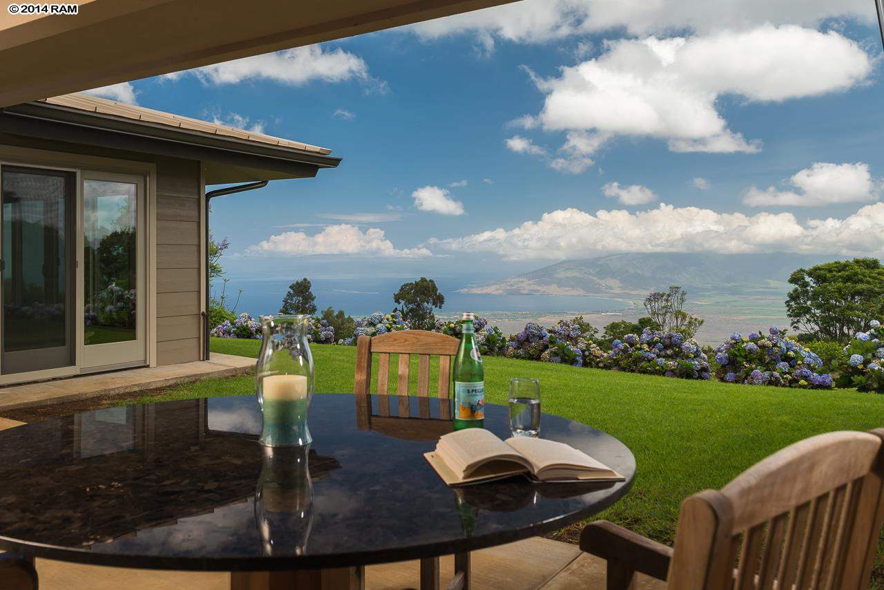 8037 Kula Highway Kula, HI 96790 - Photo 30 of 30 a view of a patio with lawn chairs