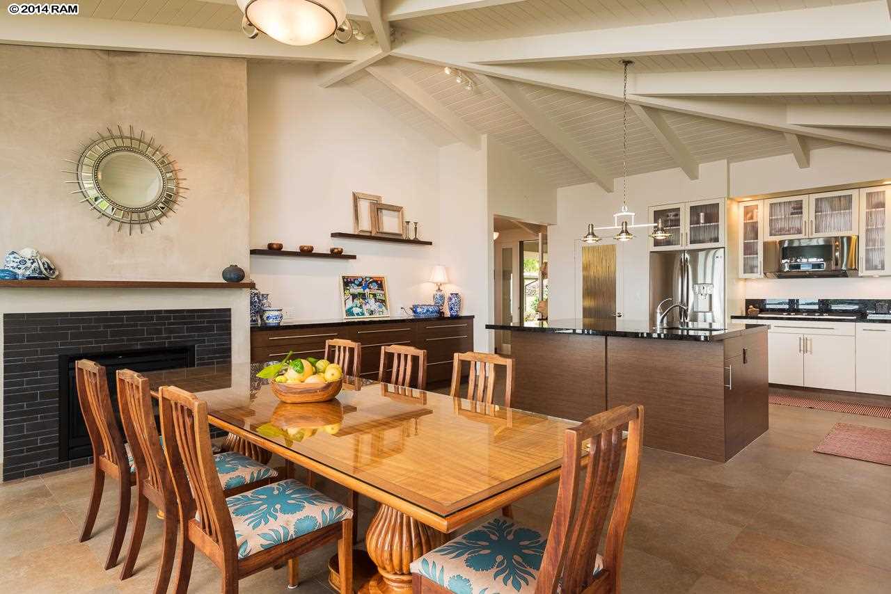 8037 Kula Highway Kula, HI 96790 - Photo 5 of 30 a dining table with chairs and kitchen view