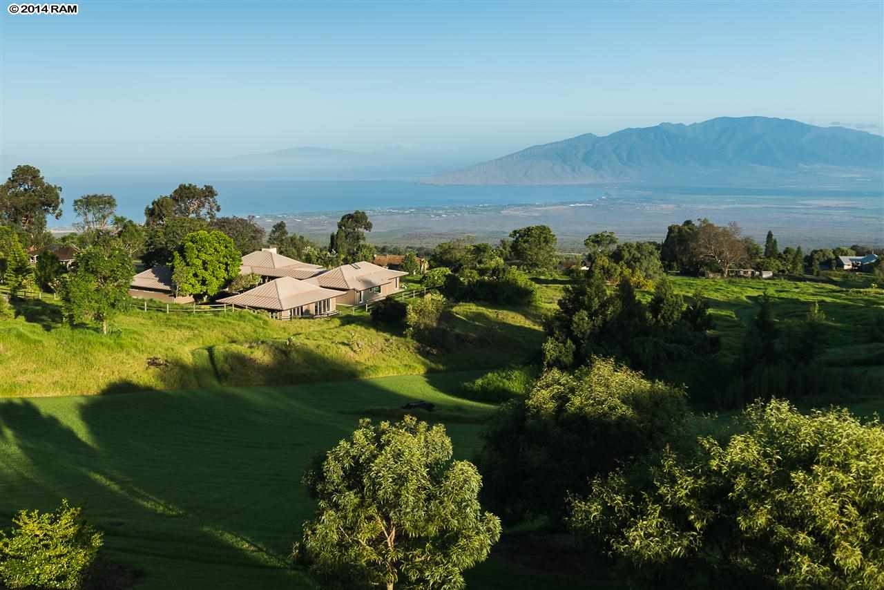 8037 Kula Highway Kula, HI 96790 - Photo 10 of 30 a view of a lake with a mountain in the background