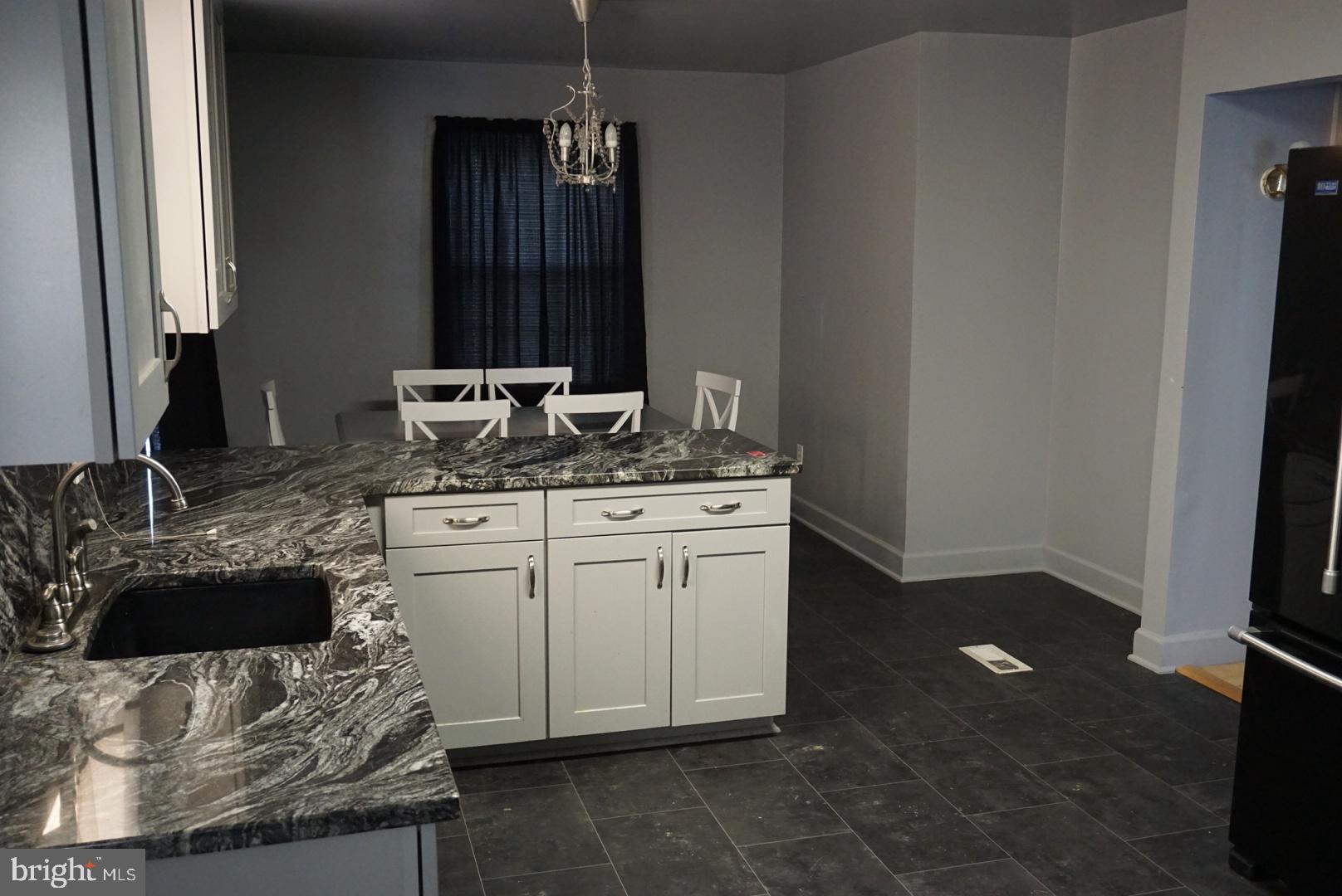 2900 Lindell Street Silver Spring, MD 20902 - Photo 6 of 6 Eat-in kitchen with new granite countertops