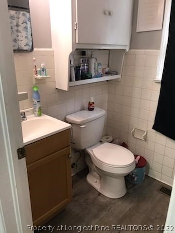 1920 Sapona Road Fayetteville, NC 28312 - Photo 13 of 15 a bathroom with a sink and a toilet