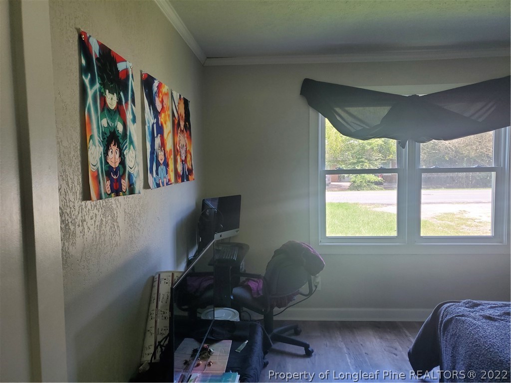 1920 Sapona Road Fayetteville, NC 28312 - Photo 8 of 15 a view of a workspace with furniture and a window