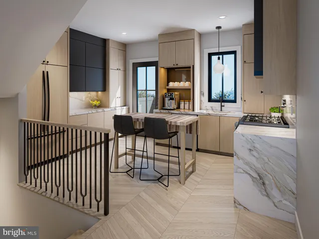 a kitchen with granite countertop cabinets a sink and appliances