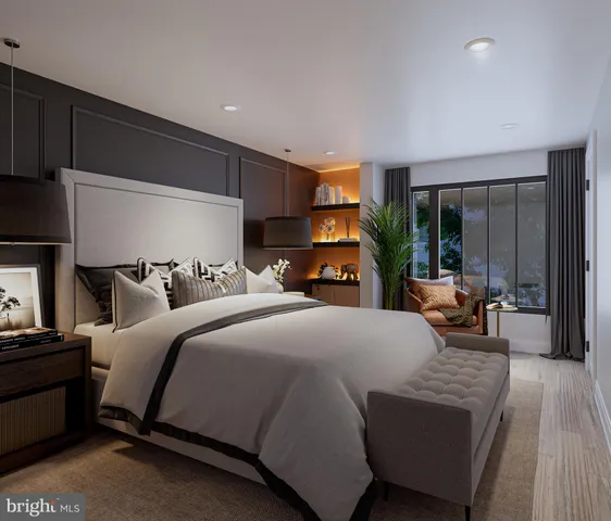 a bed room with a bed and a couch