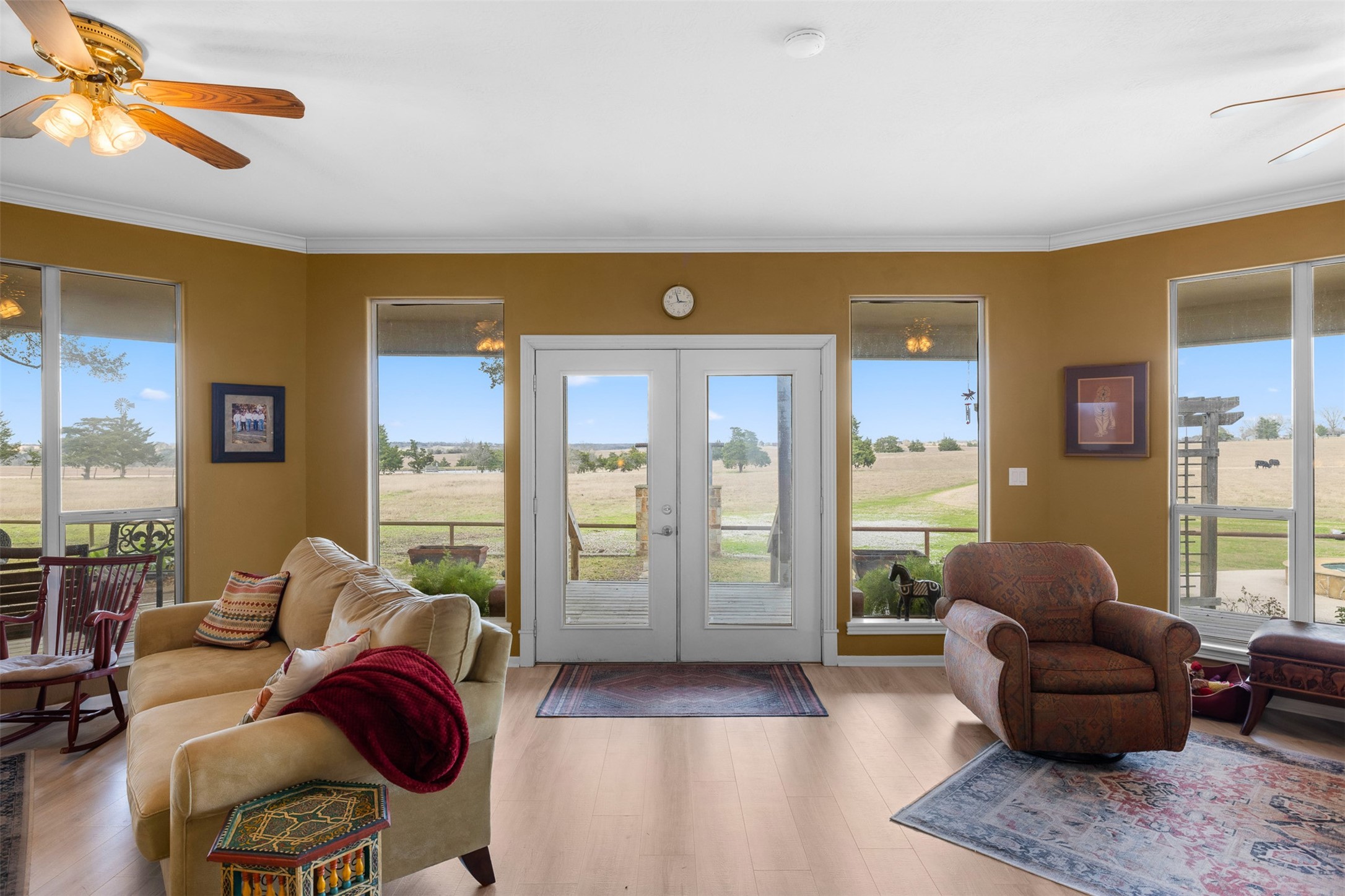 2346 Bruno Road Schulenburg, TX 78956 - Photo 1 of 49 a living room with furniture and a floor to ceiling window