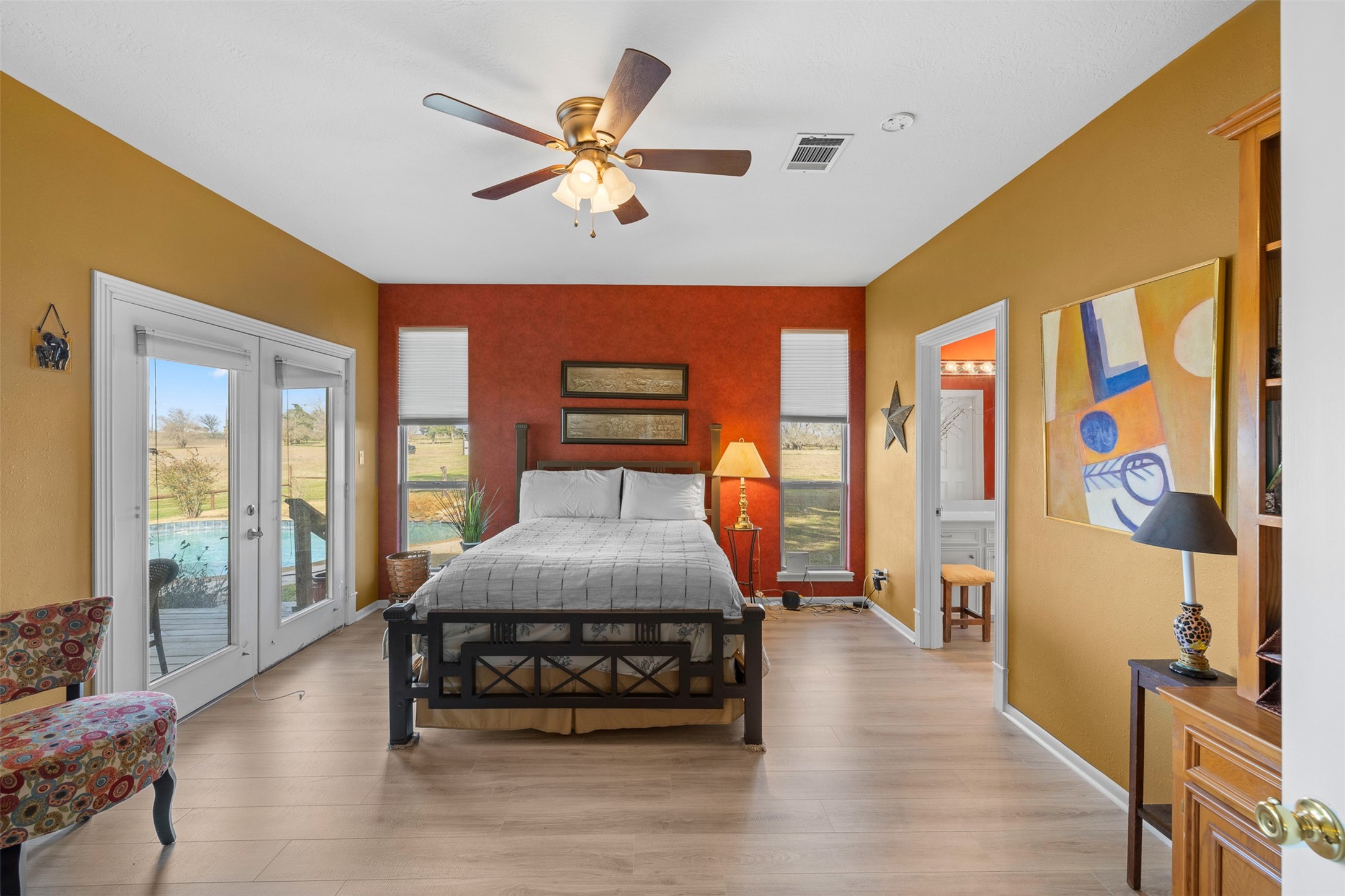 2346 Bruno Road Schulenburg, TX 78956 - Photo 17 of 49 a bedroom with a bed and wooden floor