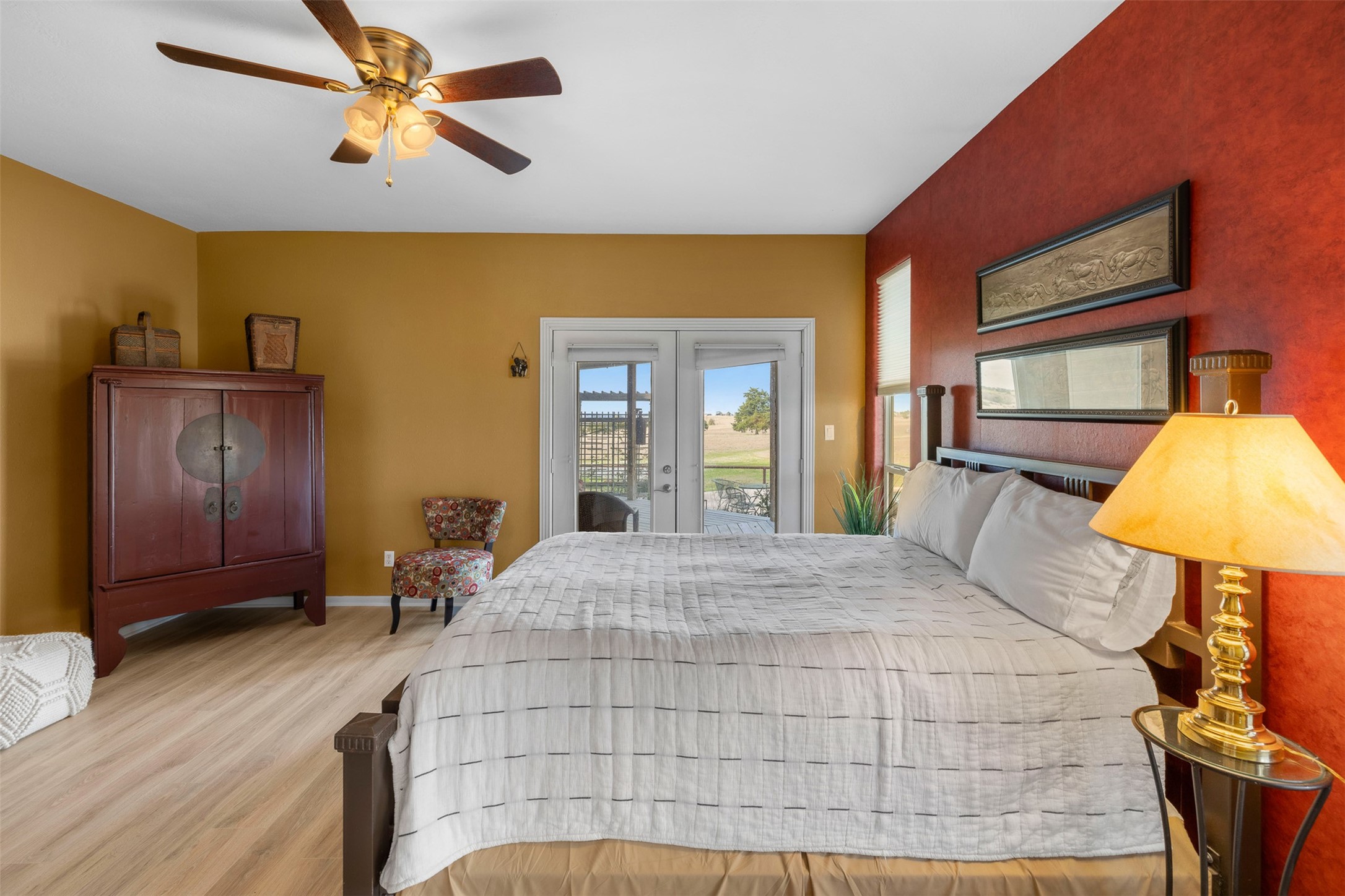 2346 Bruno Road Schulenburg, TX 78956 - Photo 18 of 49 a bedroom with a bed and a chandelier