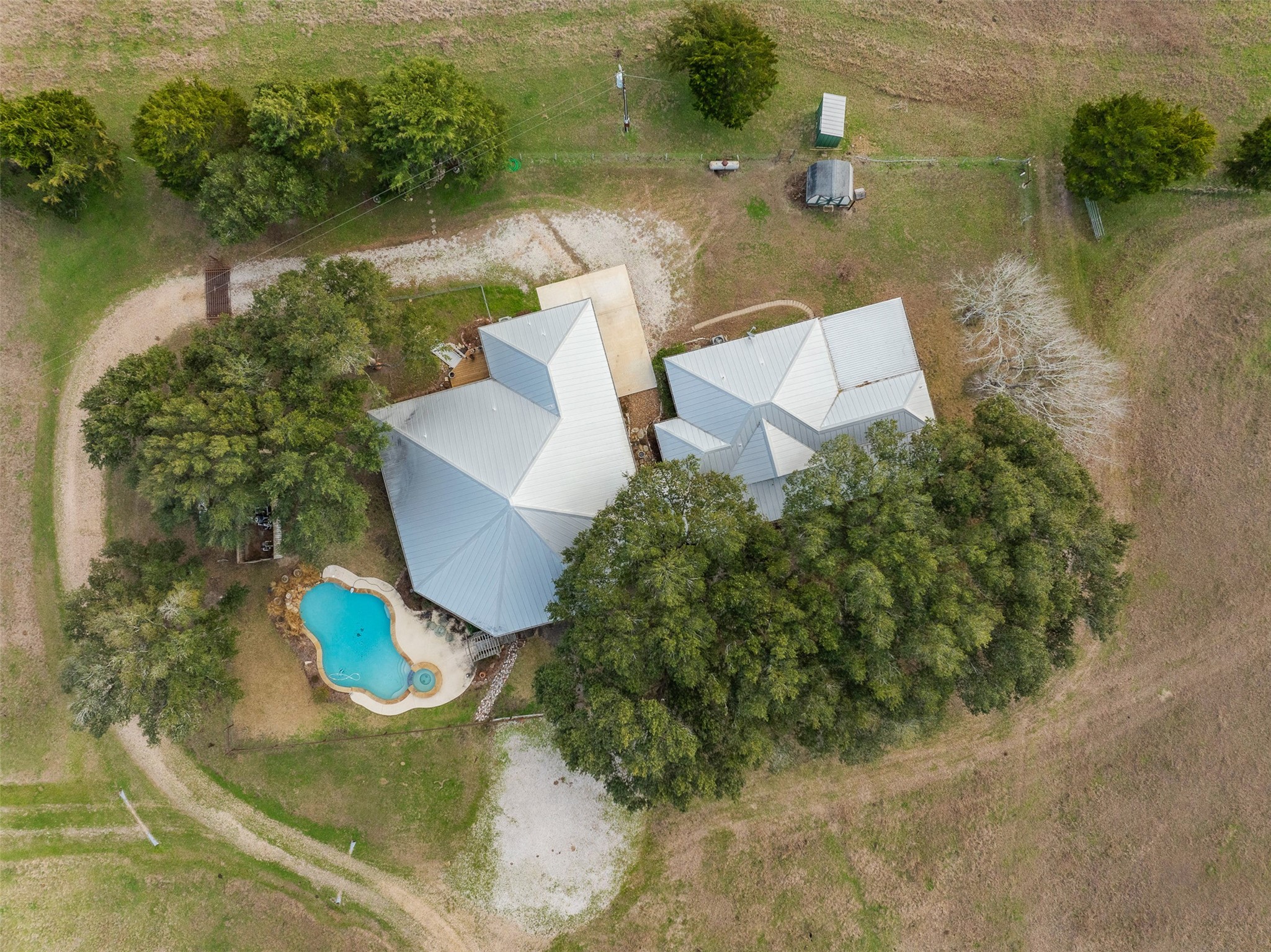 2346 Bruno Road Schulenburg, TX 78956 - Photo 2 of 49 an aerial view of a house with a yard and lake view