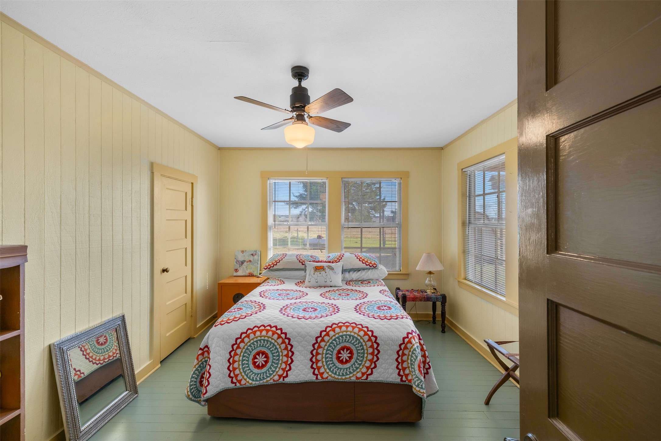 2346 Bruno Road Schulenburg, TX 78956 - Photo 28 of 49 a bedroom with a large bed and a chandelier