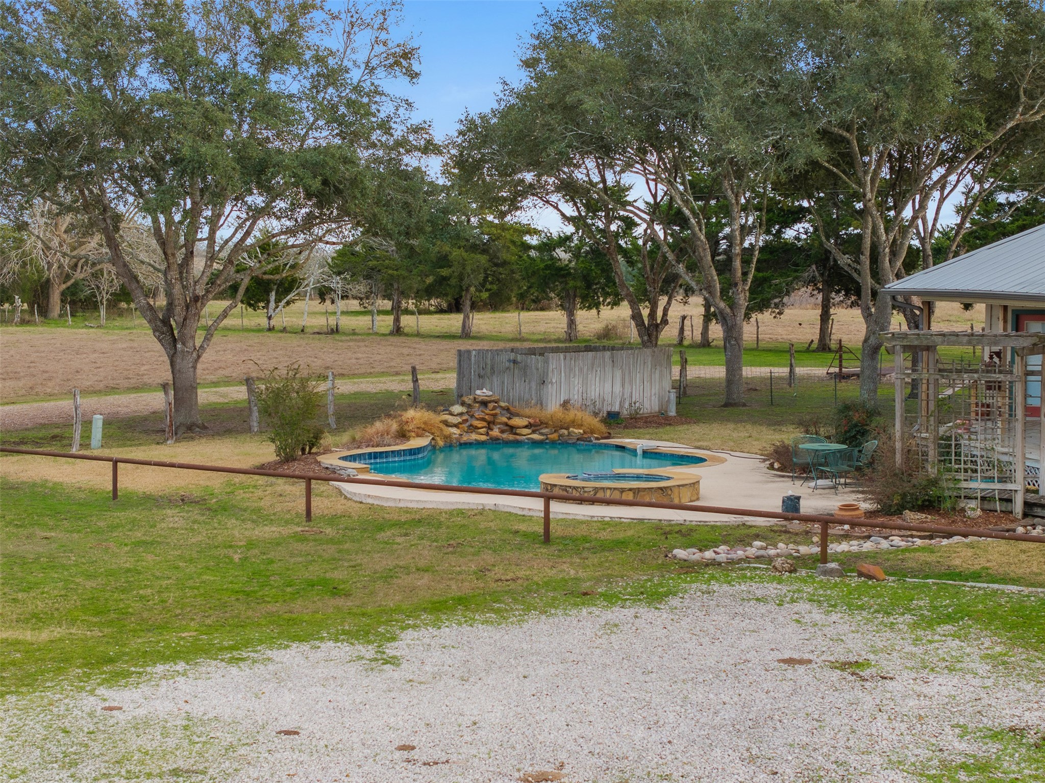 2346 Bruno Road Schulenburg, TX 78956 - Photo 4 of 49 a view of backyard with swimming pool and outdoor seating