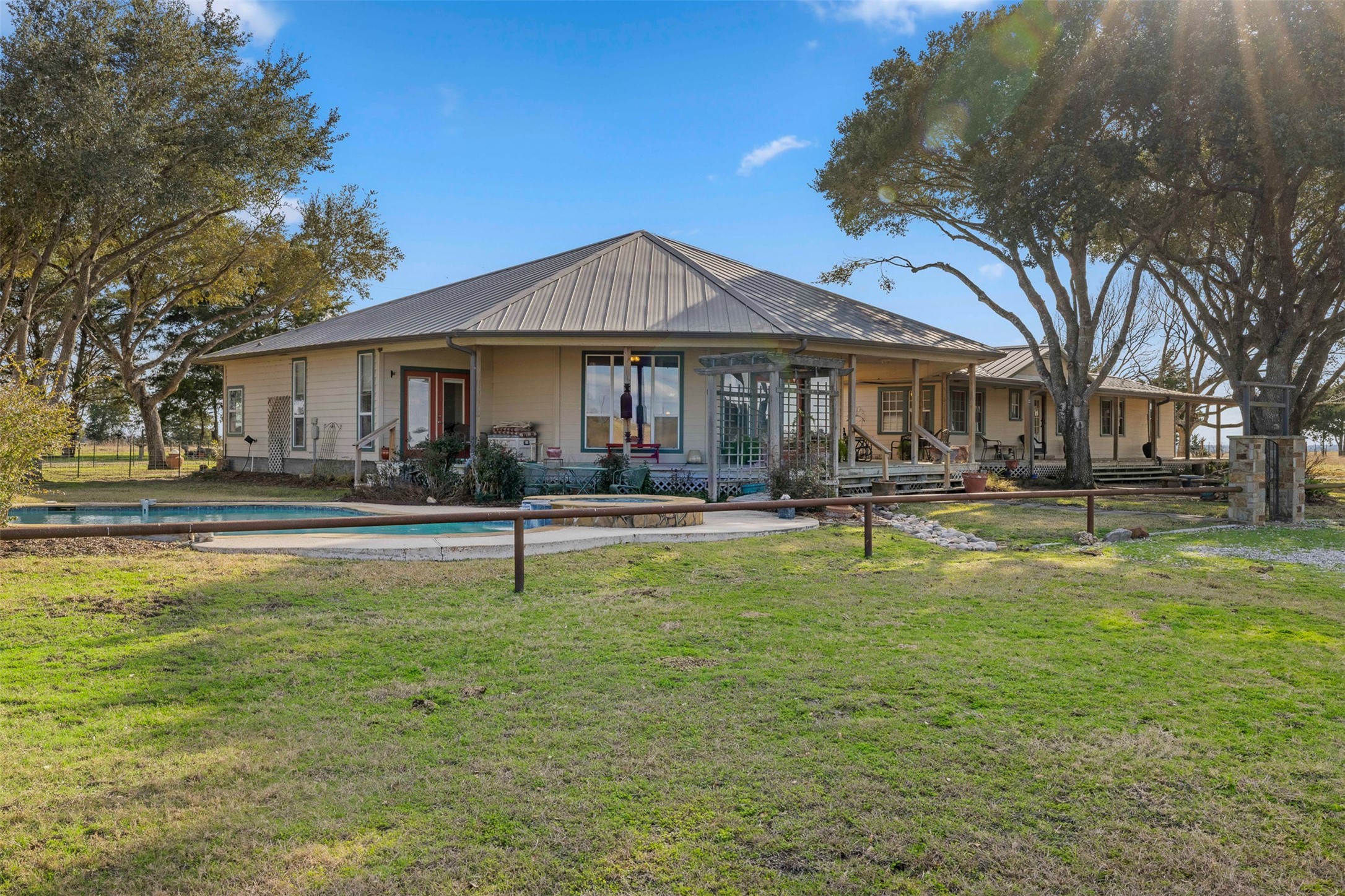 2346 Bruno Road Schulenburg, TX 78956 - Photo 7 of 49 a swimming pool view with a seating space and a garden view