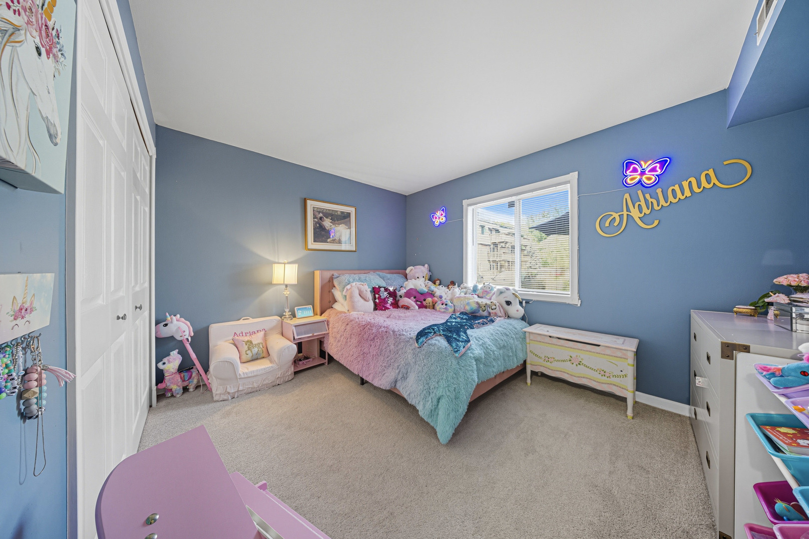 1942 Tall Oaks Drive, Unit 1A Aurora, IL 60505 - Photo 7 of 13 a bedroom with a bed and a couch