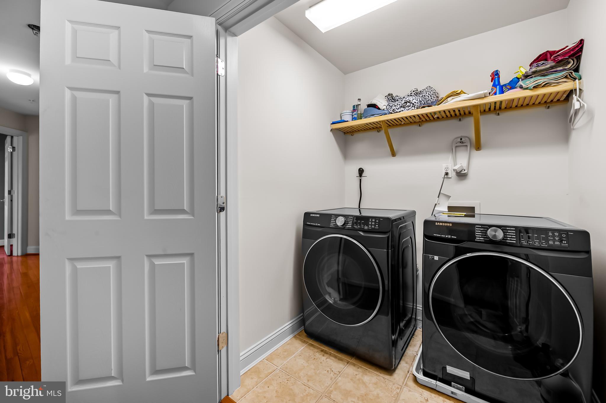 2323 Boston Street, Unit 6 Baltimore, MD 21224 - Photo 37 of 47 a utility room with dryer and washer