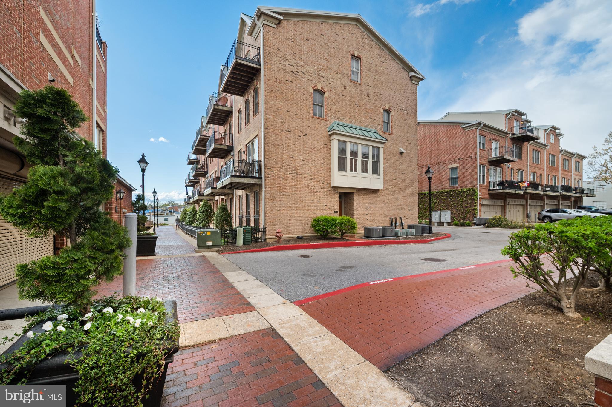 2323 Boston Street, Unit 6 Baltimore, MD 21224 - Photo 38 of 47 a front view of a house with yard