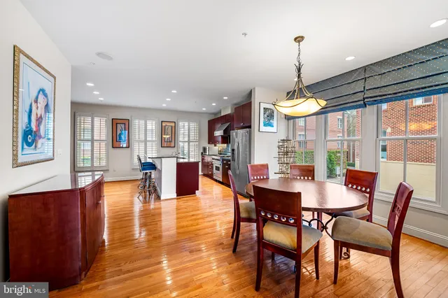a kitchen with stainless steel appliances granite countertop a stove and a sink