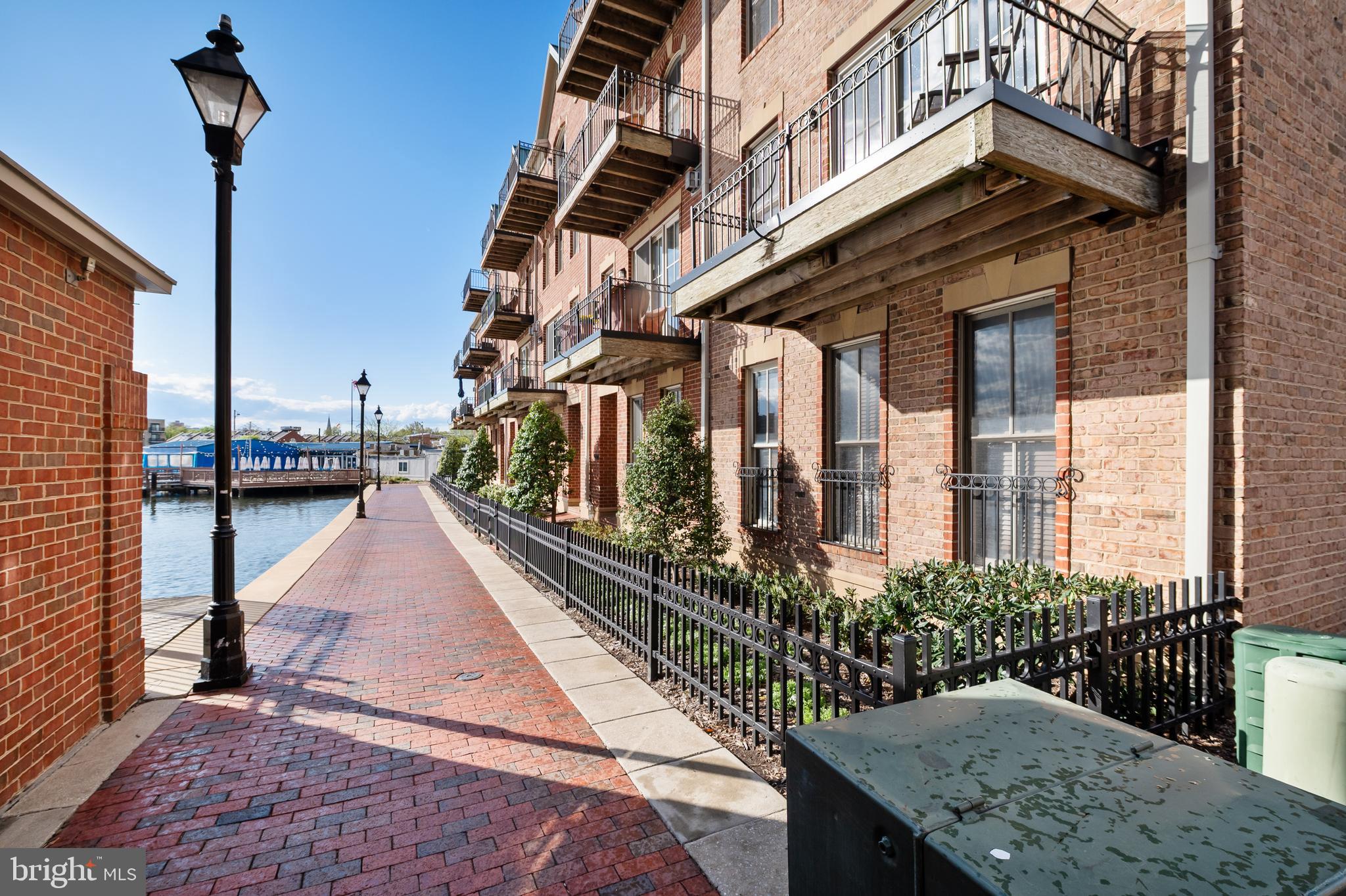 2323 Boston Street, Unit 6 Baltimore, MD 21224 - Photo 45 of 47 a view of a house with many windows