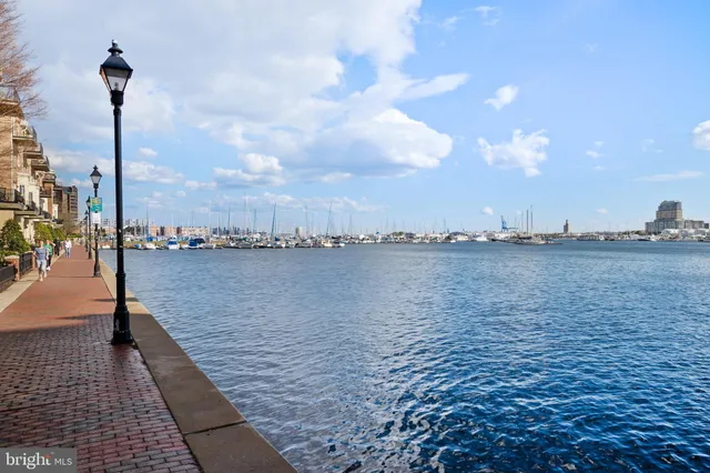 a view of a street with a building in the background