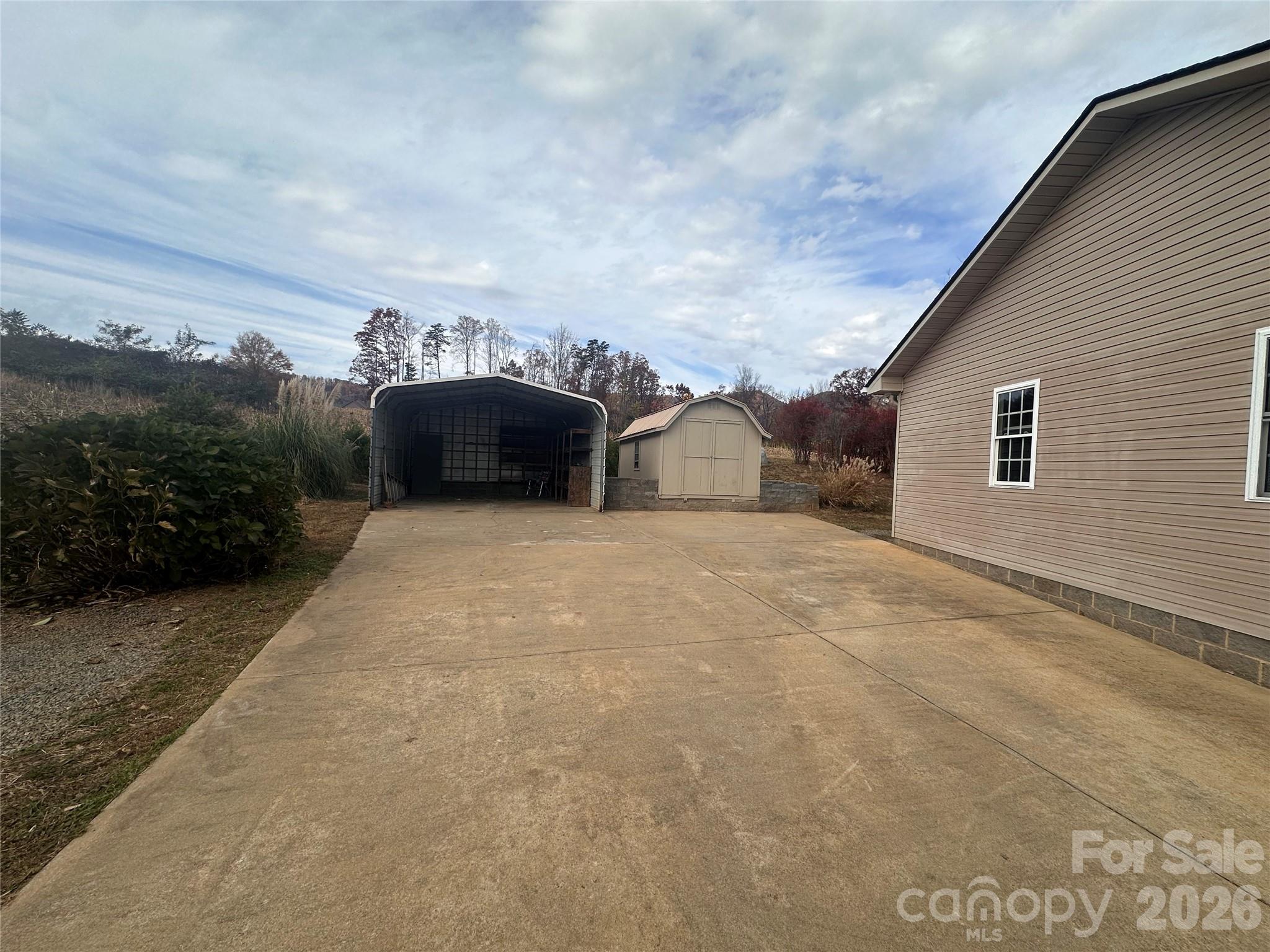12087 Traphill Road Traphill, NC 28685 - Photo 12 of 40 a view of a house with a yard