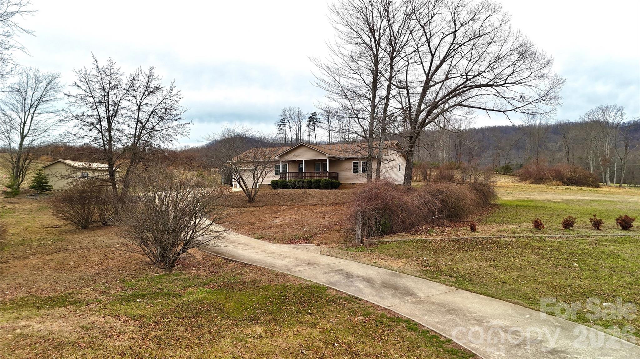 12087 Traphill Road Traphill, NC 28685 - Photo 2 of 40 a view of a town with residential house